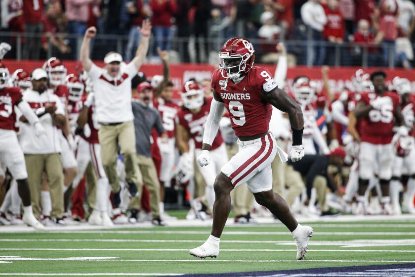 FILE - In this Dec. 7, 2019, file photo, Oklahoma linebacker Kenneth Murray (9) celebrates sacking Baylor quarterback Charlie Brewer, not pictured, during the Big 12 Championship NCAA college football game, in Arlington, Texas. Murray was selected to The Associated Press All-Big 12 Conference team, Friday, Dec. 13, 2019. (AP Photo/Brandon Wade, File)