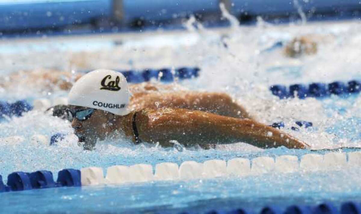 Natalie Coughlin swims in the women's 100-meter butterfly semifinals at the U.S. Olympic swimming trials on June 25.