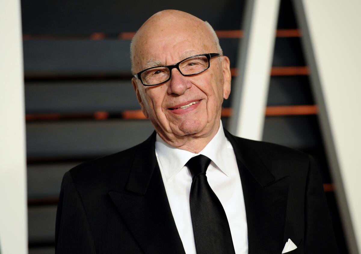 Rupert Murdoch arrives at the 2015 Vanity Fair Oscar Party.