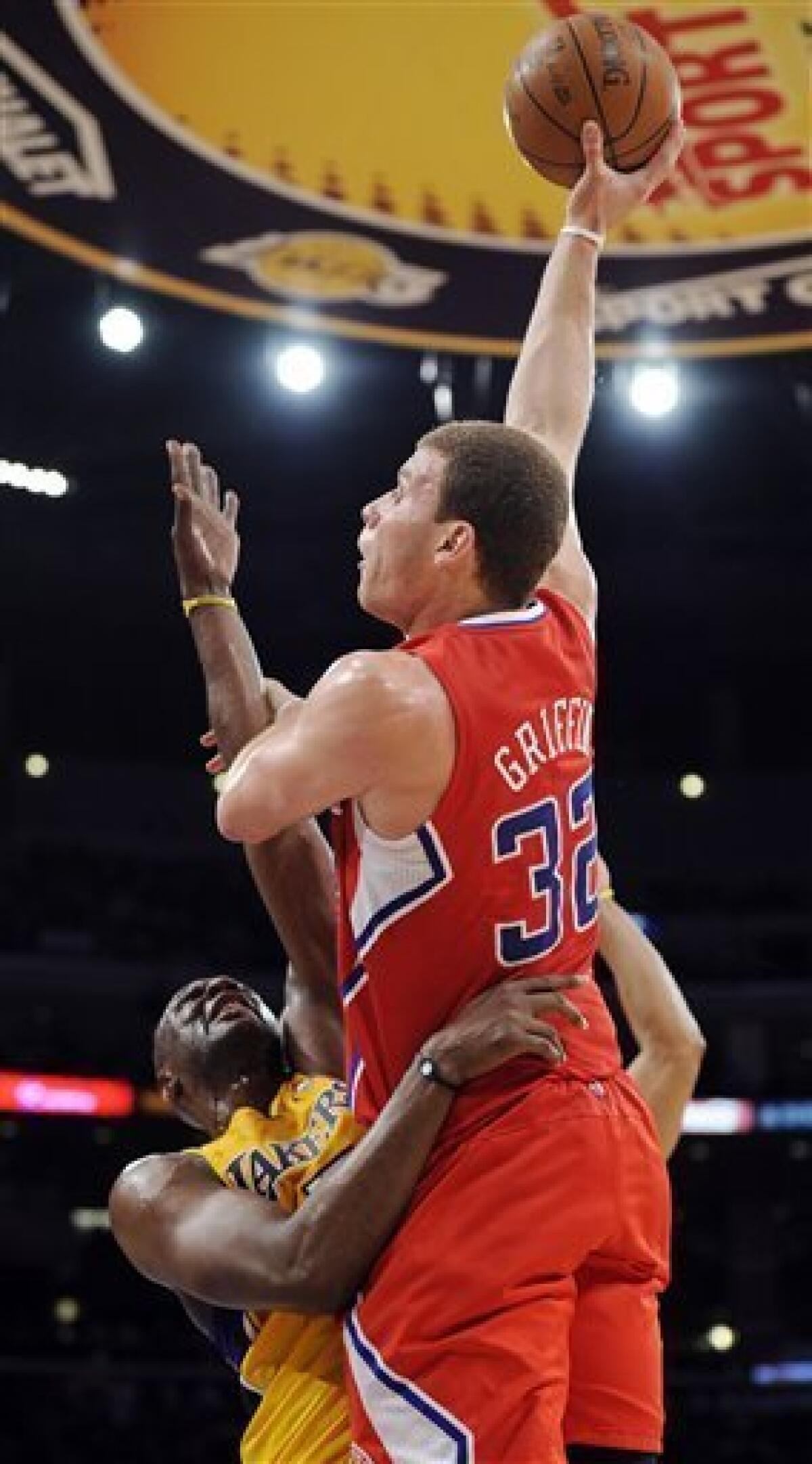 Los Angeles Lakers forward Blake Griffin (32) makes a move with the  basketball against the Dallas Mavericks during an NBA game, Dec. 5, 2012 in  Los Angeles. The Clippers defeated the Mavericks