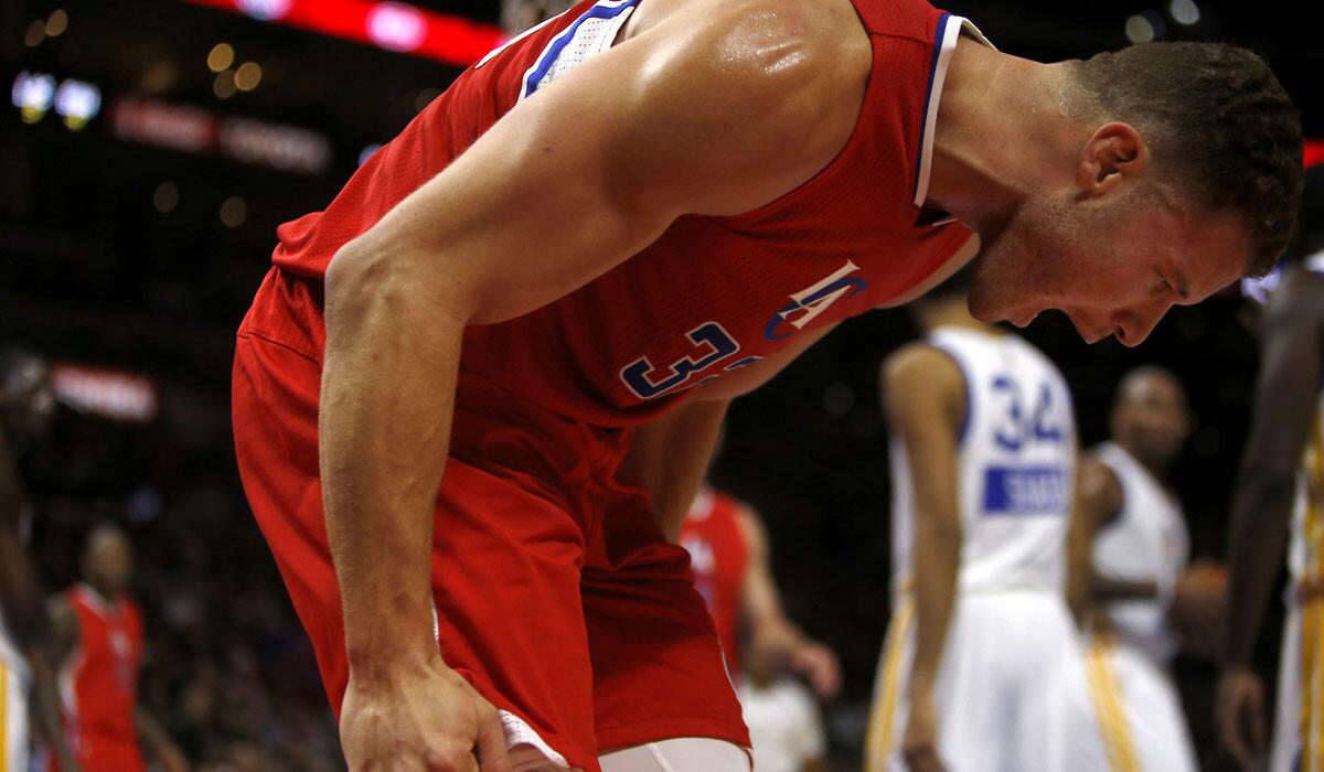 Clippers forward Blake Griffin lets out a yell in frustration during the Christmas Day game against the Warriors.