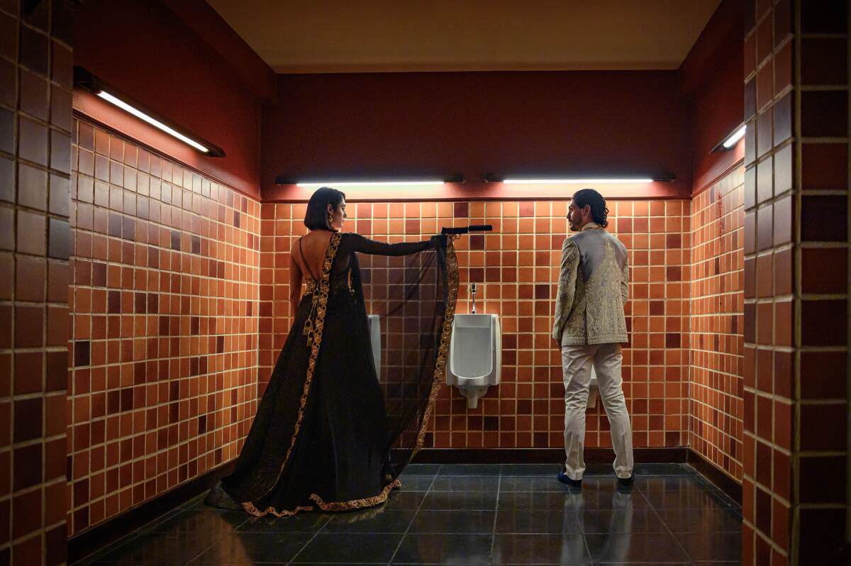 Golshifteh Farahani  and Priyanshu Painyuli in "Extraction."