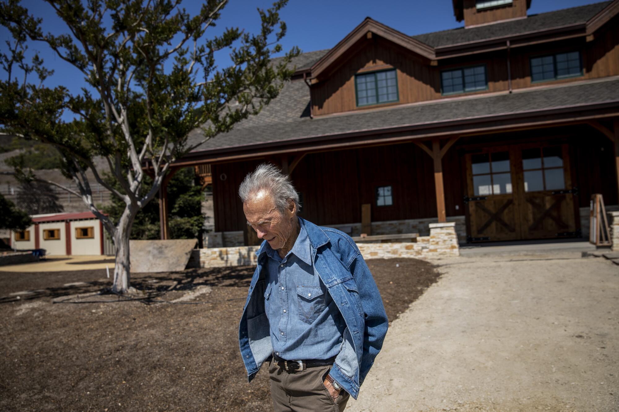 Clint Eastwood walking near the stables at his Tehama Golf Club in Carmel-by-the-Sea,  Calif. 