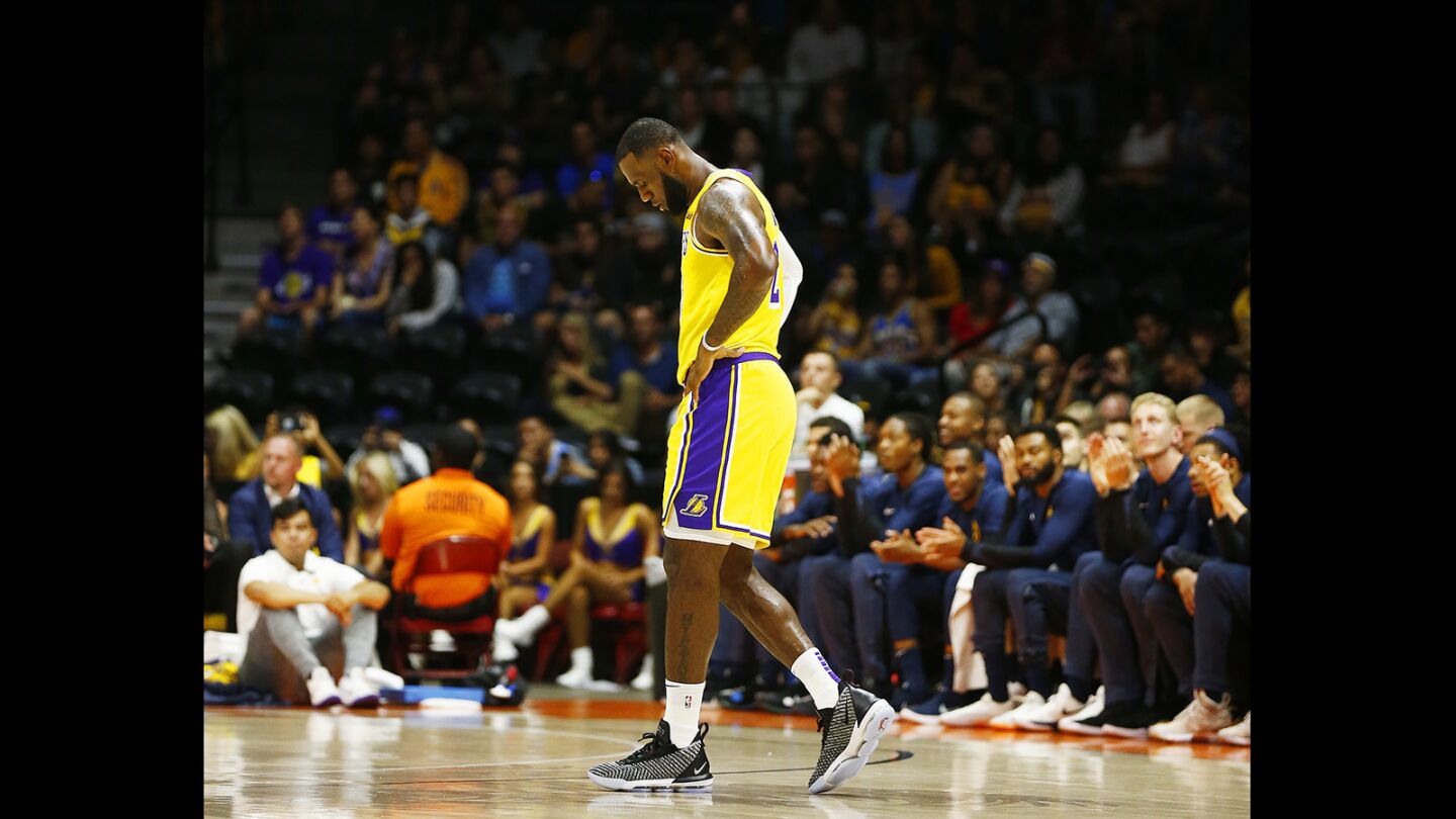 Los Angeles Lakers LeBron James looks on during a game against the Denver Nuggets in San Diego on Sunday, September 30, 2018. (Photo by K.C. Alfred/San Diego Union-Tribune)