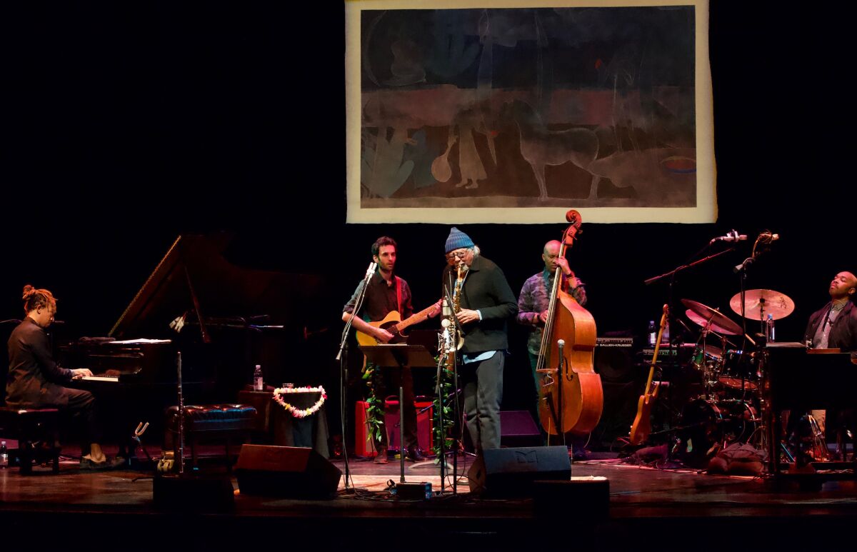 Sax great Charles Lloyd (center) is shown with his band at is 80th birthday concert in Santa Barbara. Pianist Gerald Clayton, who will perform with Lloyd in San Diego on June 2, is at left.