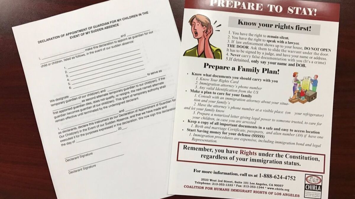 Guardian slips and information sheets distributed to Los Angeles-area immigrant families by aid organizations. (Los Angeles Times)