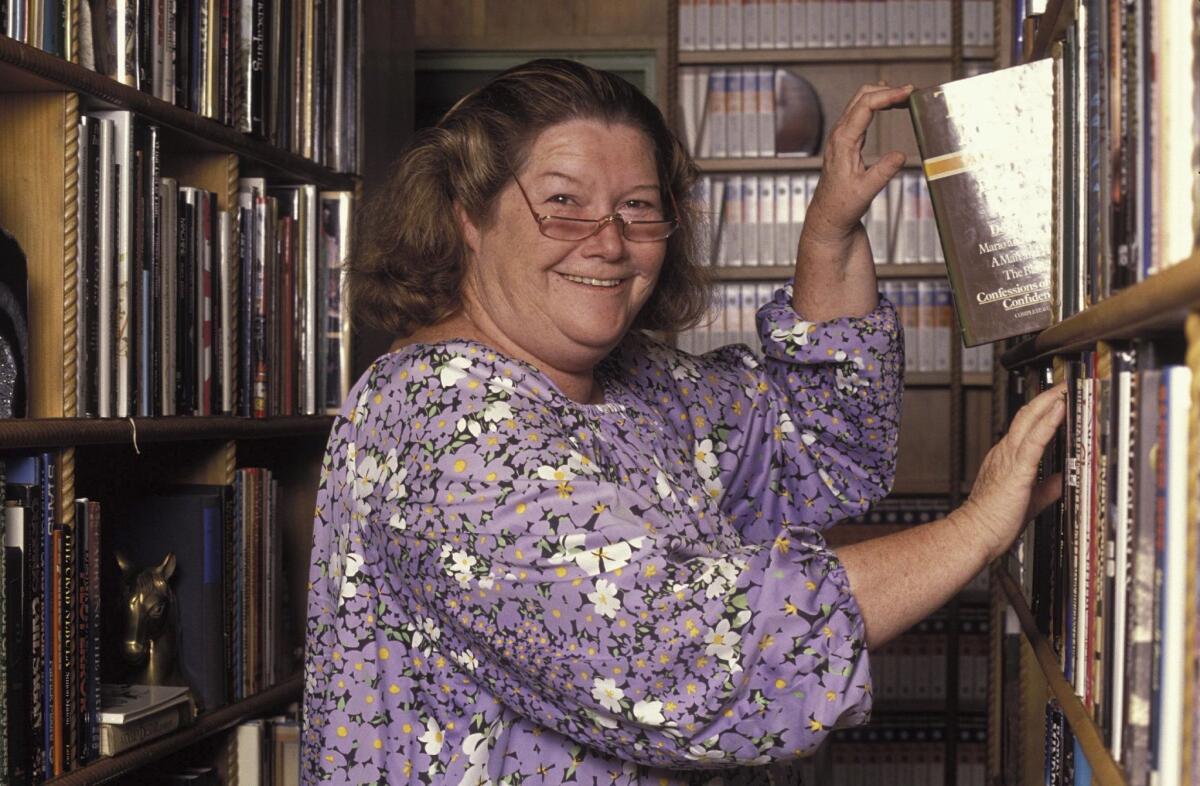Colleen McCullough, author of the bestseller "The Thorn Birds," posed for a photo at her home on Norfolk Island in 1990. She died Jan. 29 at age 77.