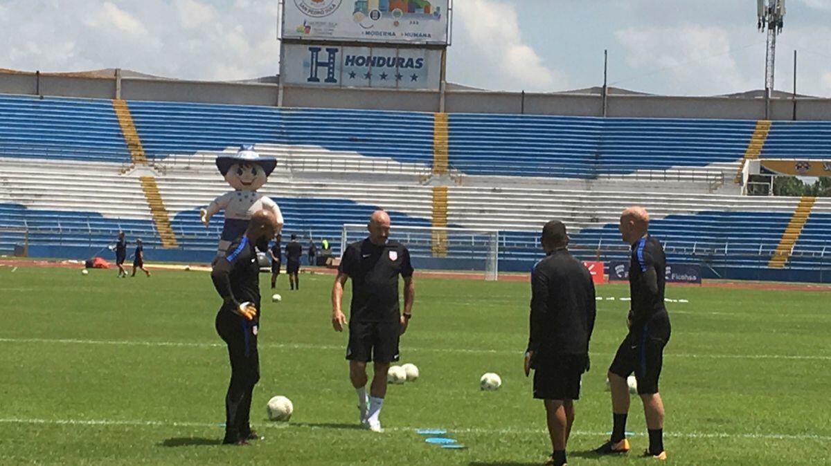 U.S. soccer goalkeepers Tim Howard, left, Nick Rimando, second from right, Brad Guzman, right, and goalkeeper coach Matt Reis practice Monday at Estadio Olimpico Metropolitano in San Pedro Sula, Honduras.