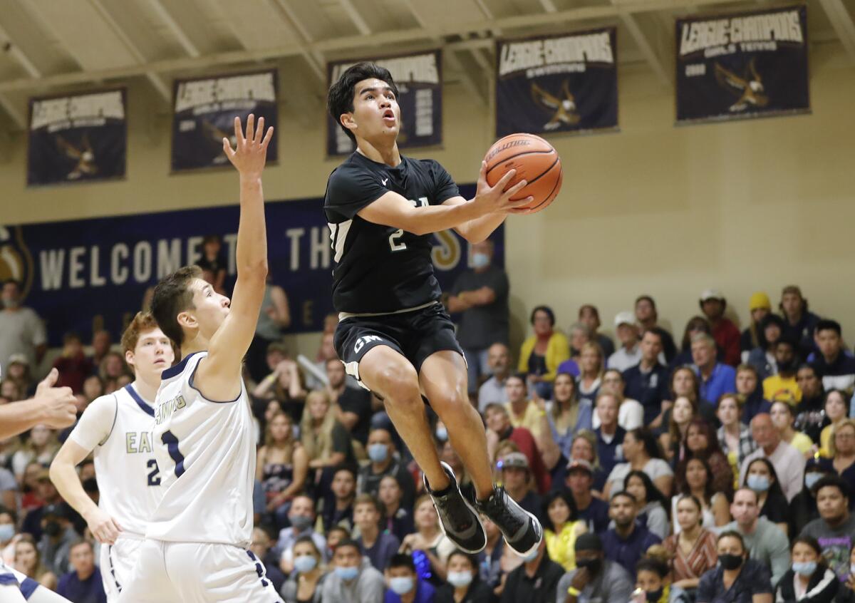 Aiden Spallone (2) of Costa Mesa lays it up and in during the CIF Southern Section Division 5AA final on Wednesday.