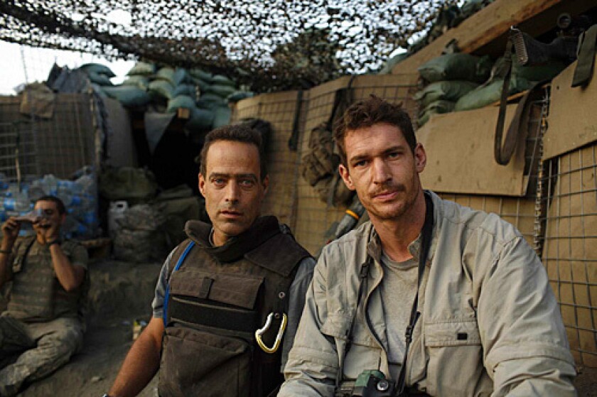 Sebastian Junger, left, and Tim Hetherington at Restrepo in Afghanistan.
