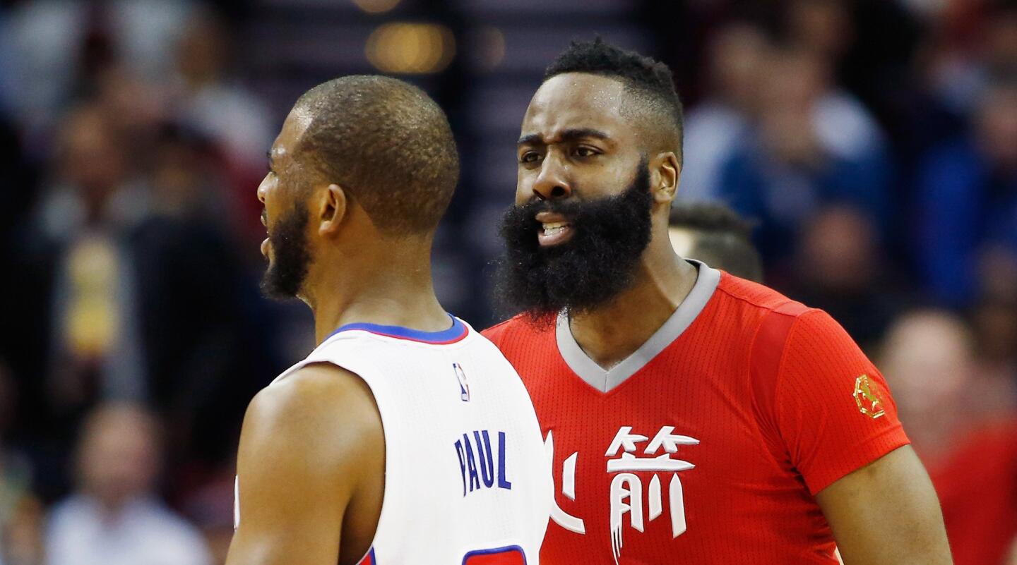 Rockets guard James Harden yells at Clippers point guard Chris Paul after a late foul in the Rockets' 110-105 victory.