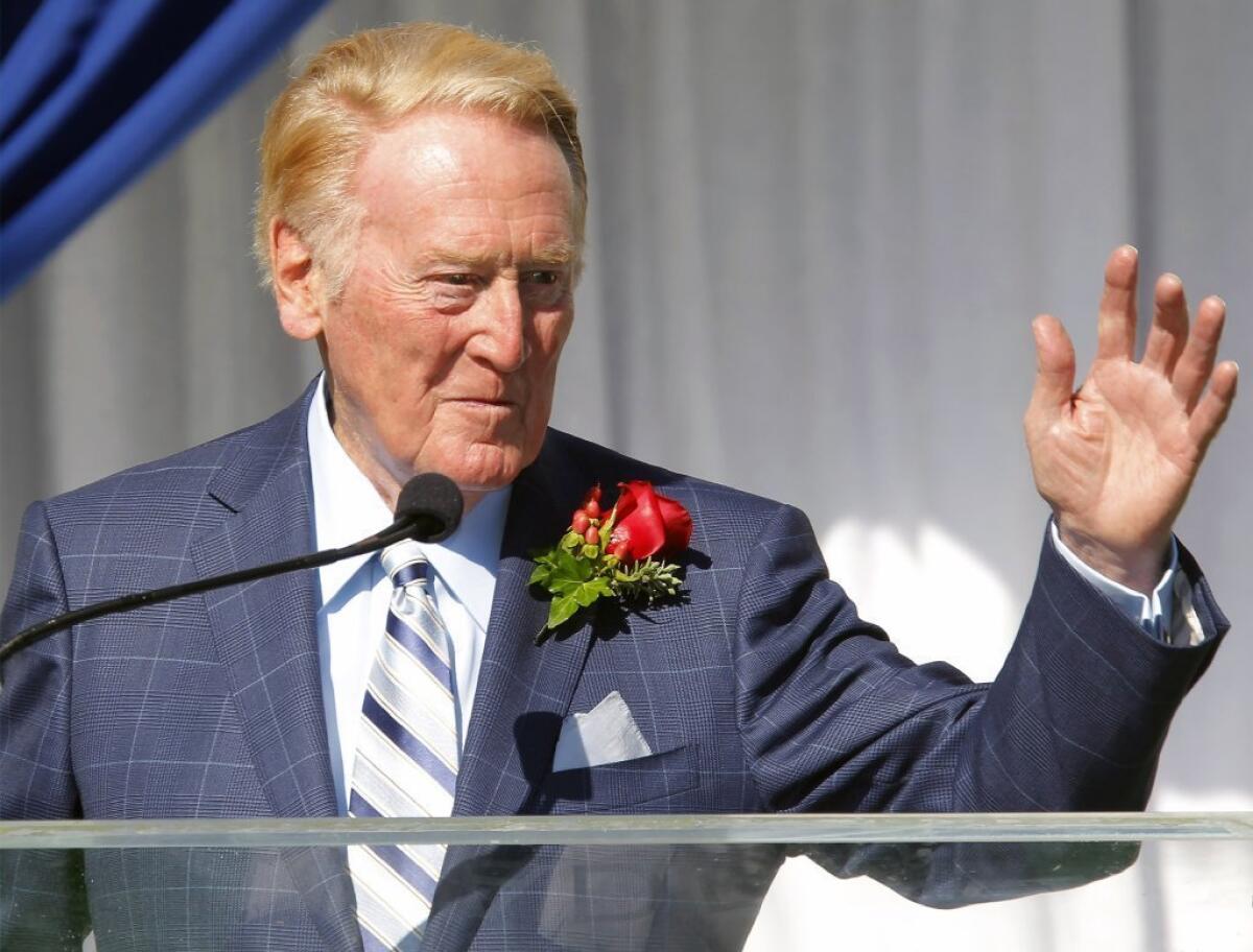 Hall of Fame broadcaster Vin Scully is introduced on Thursday as the grand marshal for the 125th Tournament of Roses parade.
