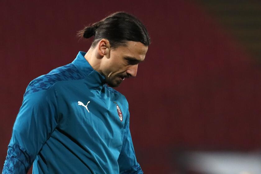 AC Milan's Zlatan Ibrahimovic looks on during warm up before the Europa League.