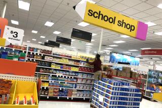 COLMA, CALIFORNIA - AUGUST 03: A worker stocks shelves of back-to-school supplies at a Target store on August 03, 2020 in Colma, California. In the midst of the ongoing coronavirus pandemic, back-to-school shopping has mostly moved to online sales, with purchases shifting from clothing to laptop computers and home schooling supplies. (Photo by Justin Sullivan/Getty Images)