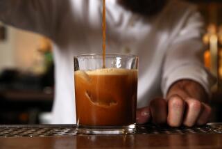 LOS ANGELES, CA-NOVEMBER 19, 2019: Mike Horan, Beverage Director at Hotel Figueroa, pours a Pumpkin Spice Spiked Coffee over ice at downtown's Historic Hotel Figueroa on November 19, 2019, in Los Angeles, California (Photo By Dania Maxwell / Los Angeles Times)