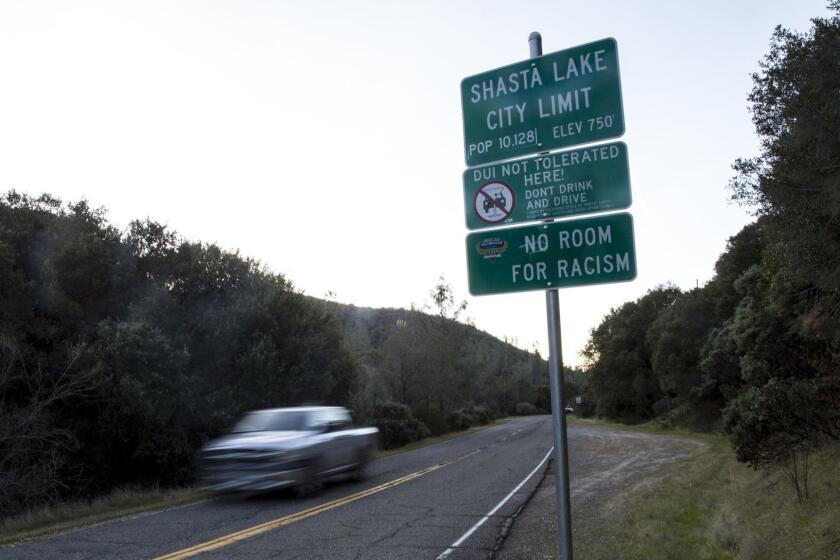 SHASTA LAKE, CA - FEBRUARY 17: A sign reads "No Room for Racism," along County Highway 148 near the city limits of Shasta Lake on February 17, 2018 in Shasta Lake, California. (Kent Nishimura / Los Angeles Times)