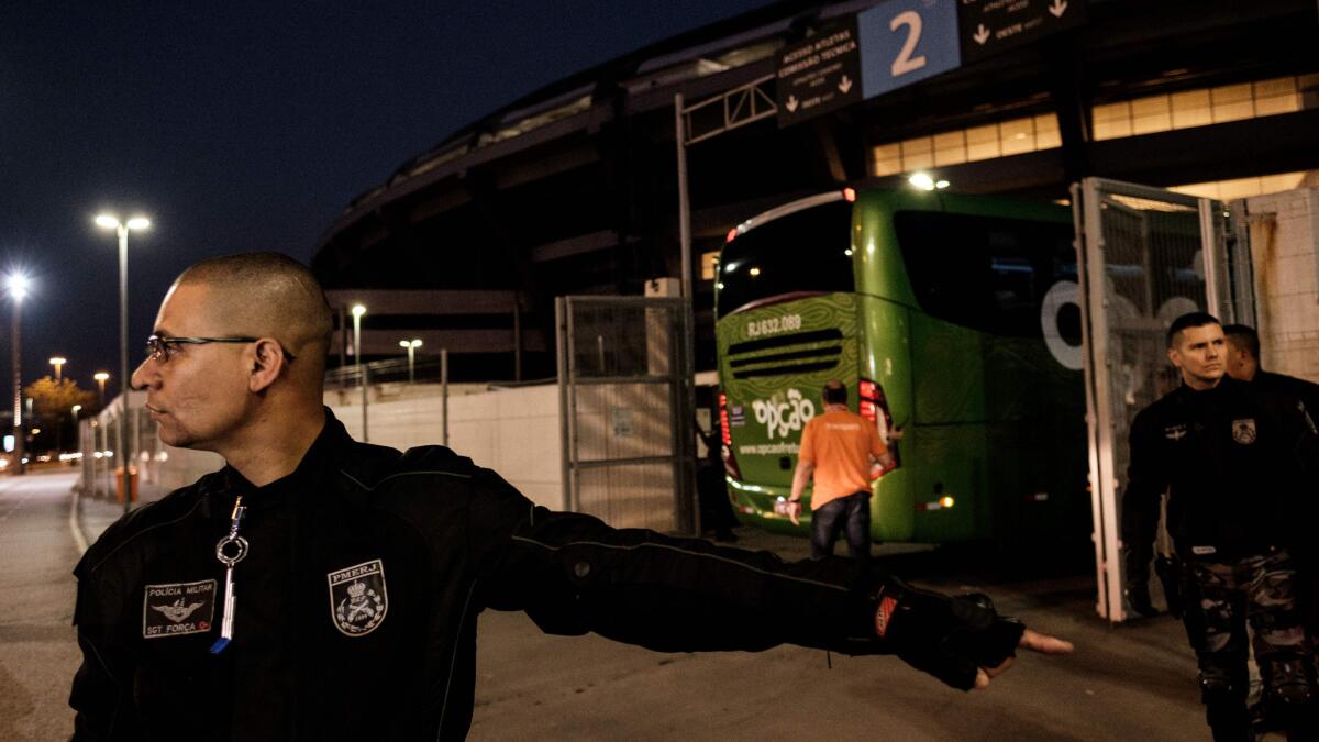 Brazilian police carry out a security drill ahead of the Olympic games at Maracana Stadium in Rio de Janeiro.