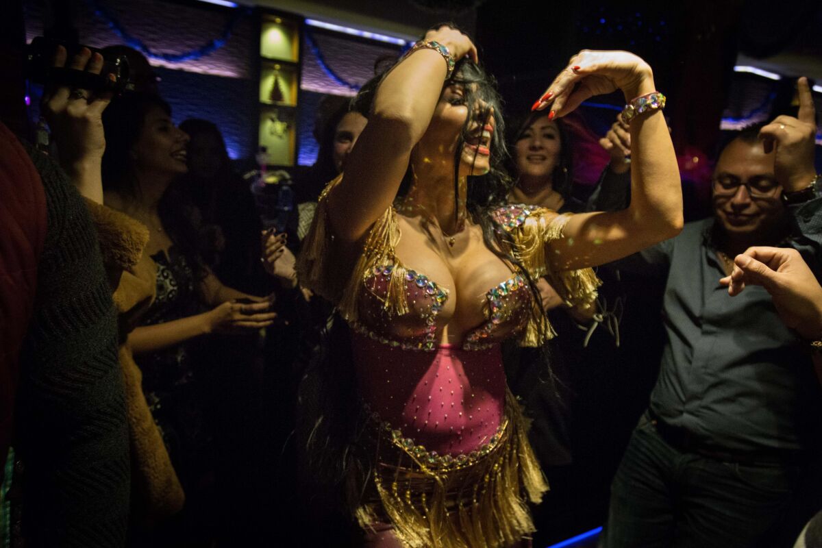 Belly dancer Farah Nasri wearing a costume designed by Eman Zaky at a show in a nightclub in Cairo, Egypt, January 8, 2019