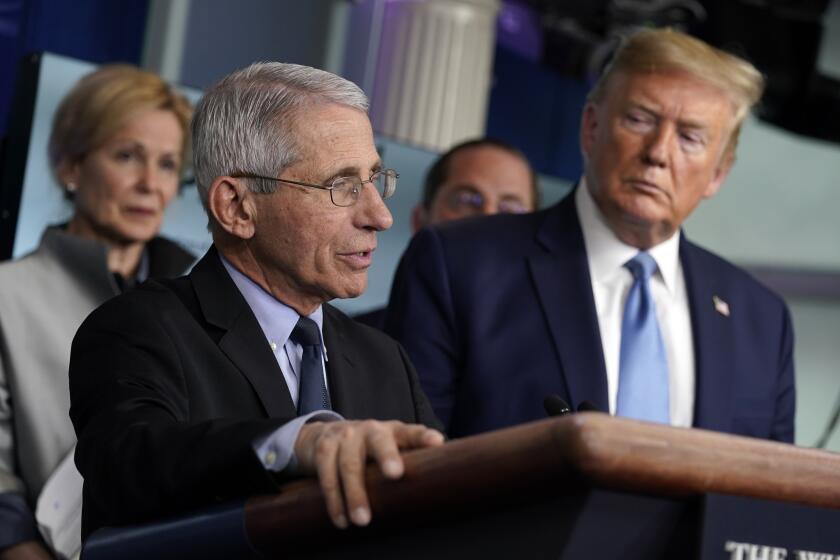 Dr. Anthony Fauci, director of the National Institute of Allergy and Infectious Diseases, speaks as Dr. Deborah Birx, White House coronavirus response coordinator, and President Donald Trump listen during a press briefing with the coronavirus task force, at the White House, Monday, March 16, 2020, in Washington. (AP Photo/Evan Vucci)