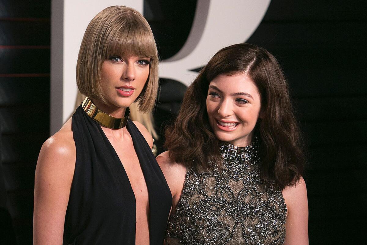 Lorde, right, with Taylor Swift at the 2016 Vanity Fair Oscar Party.