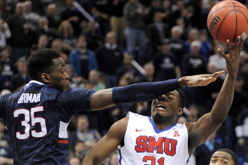 Connecticut's Amida Brimah (35) tries to block a shot by SMU's Ben Emelogu in the second half Sunday.