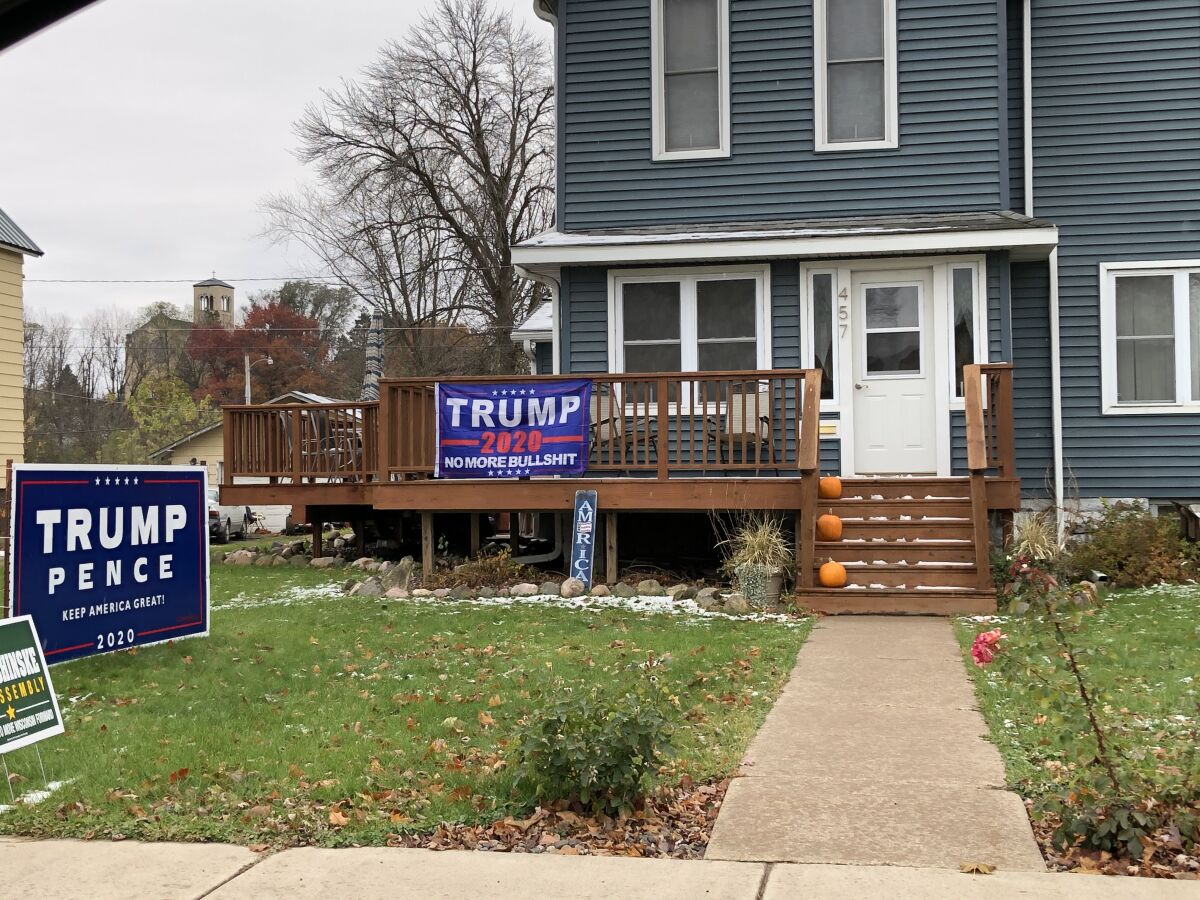 A home is decorated in pro-Trump signs in Arcadia, Wis. 