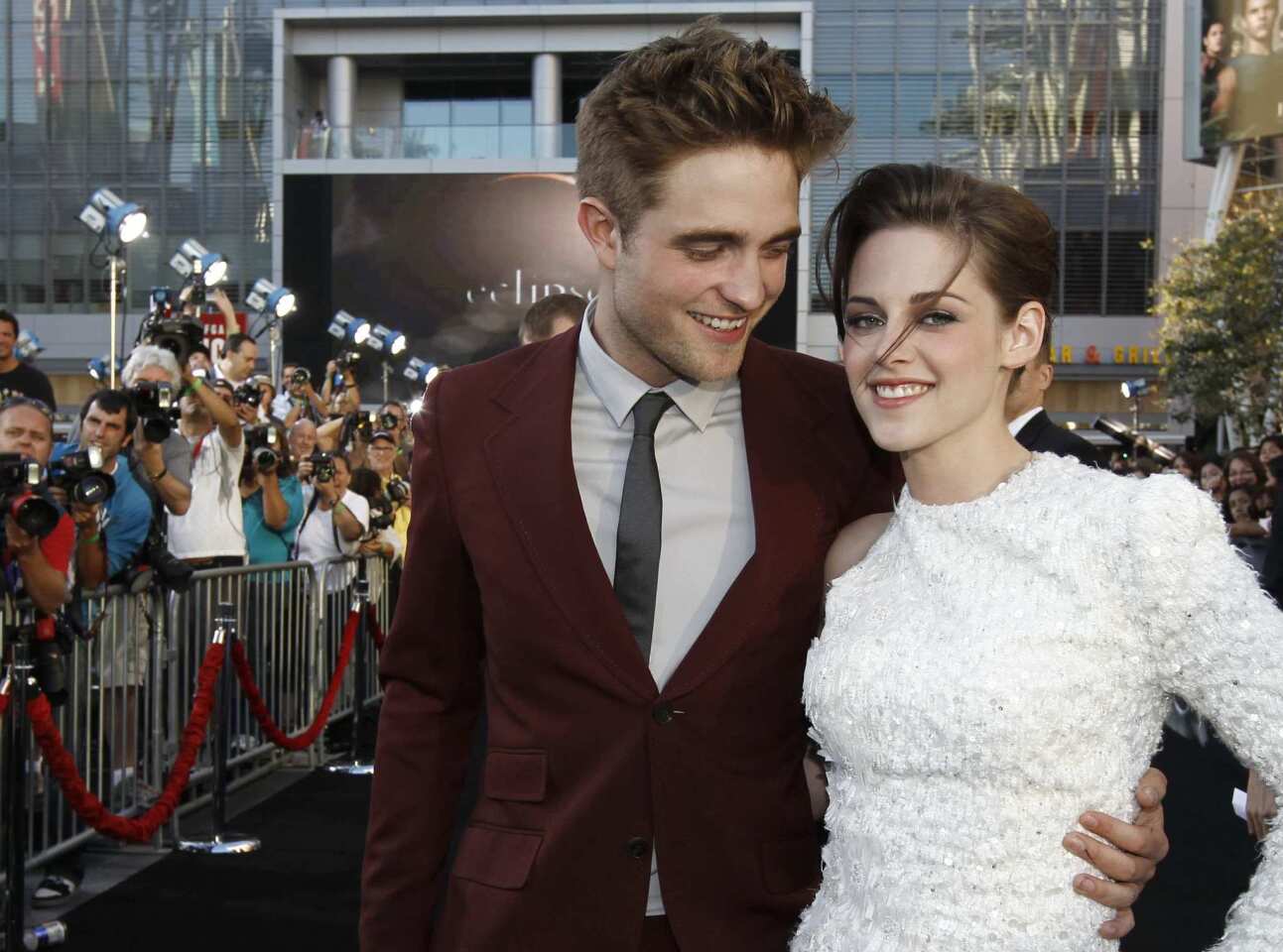 "Eclipse" premieres to dizzying fanfare in June 2010 with massive crowds in downtown Los Angeles. Success hadn't affected their relationship, nor their laid-back personalities. Rob and Kristen attended the after party as a couple, and Stewart even shook off her mini-dress for jeans and sneakers.