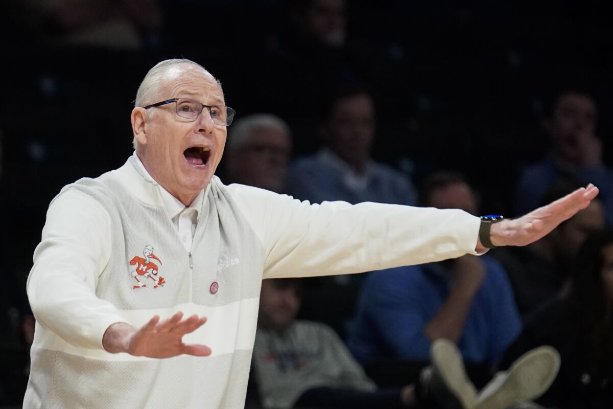 Miami head coach Jim Larranaga works the bench in the second half of an NCAA college basketball game against Boston College during quarterfinals of the Atlantic Coast Conference men's tournament, Thursday, March 10, 2022, in New York. (AP Photo/John Minchillo)