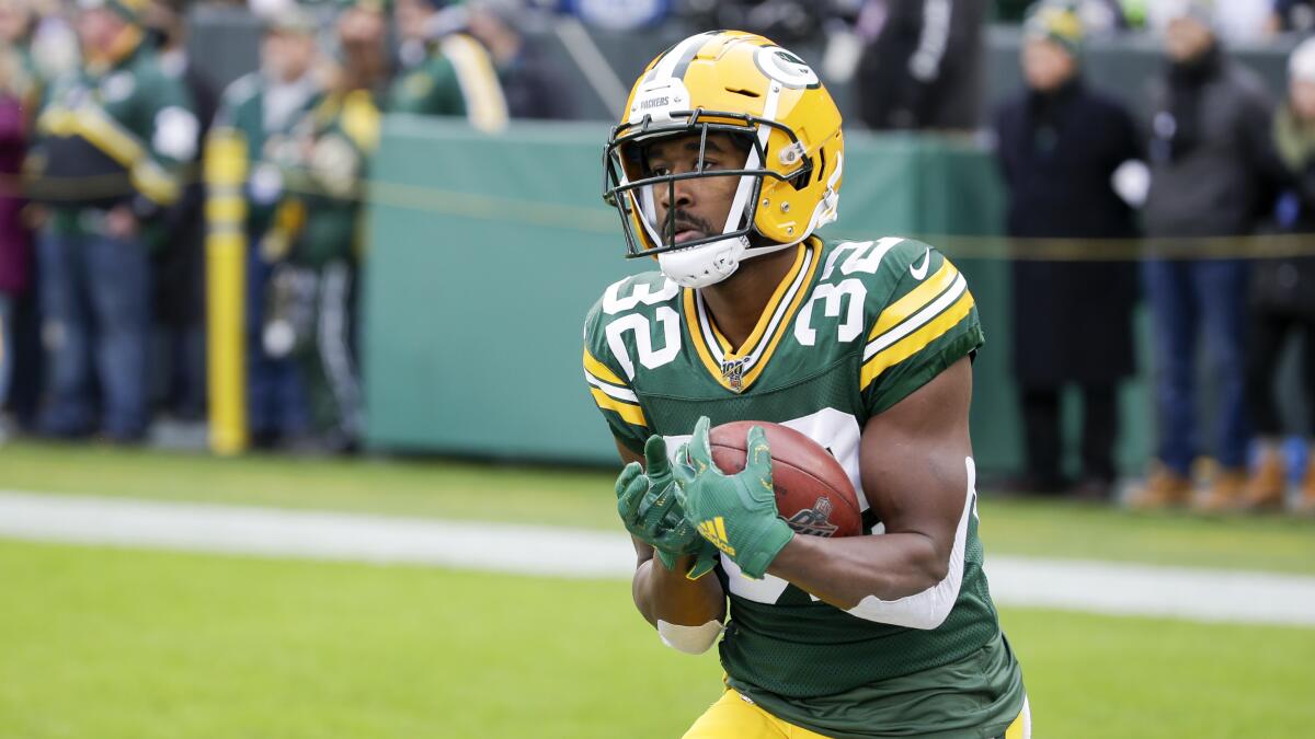 Green Bay Packers' Tyler Ervin catches a ball before an NFL football game against the Washington Redskins Sunday, Dec. 8, 2019, in Green Bay, Wis. (AP Photo/Mike Roemer)