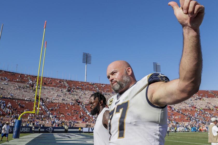 LOS ANGELES, CA, SUNDAY, SEPTEMBER 23, 2018 - Rams tackle Andrew Whitworth gestures to fans after a 35-23 win over the Chargers at the Coliseum. (Robert Gauthier/Los Angeles Times)