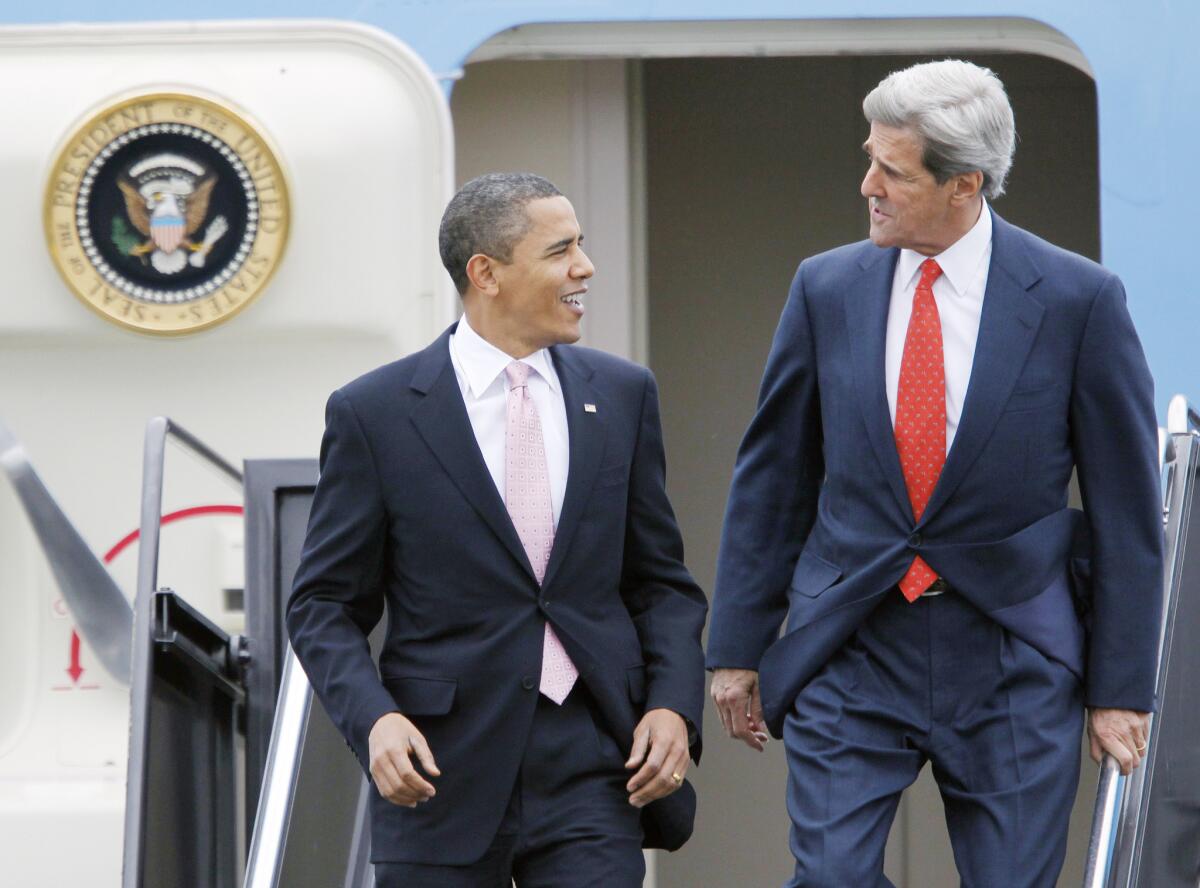 President Obama is seen with then Sen. John Kerry (D-Mass.) arriving at Logan International Airport in Boston in 2009. Kerry is now Secretary of State.