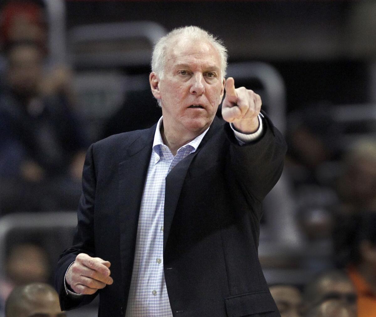 San Antonio Spurs Coach Gregg Popovich directs his players during a 115-92 loss to the Clippers at Staples Center.