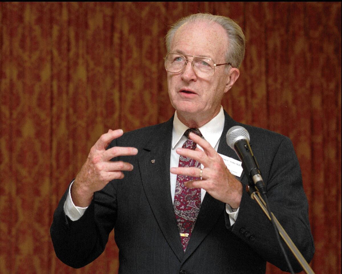 Dr. John Willke, shown in 1995, argued that a woman's body can resist conception during a sexual assault, an idea debunked by science.