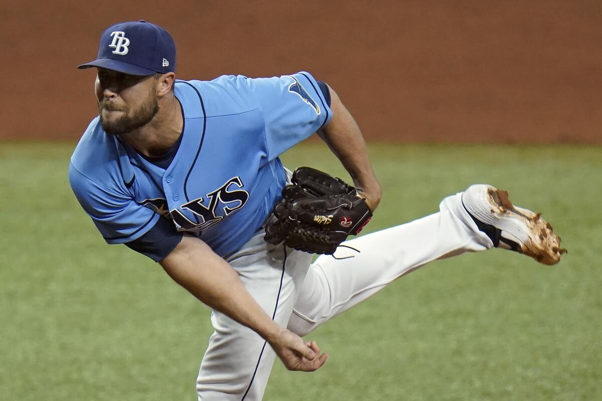 Hunter Strickland pitches for the Tampa Bay Rays on May 13, 2021.