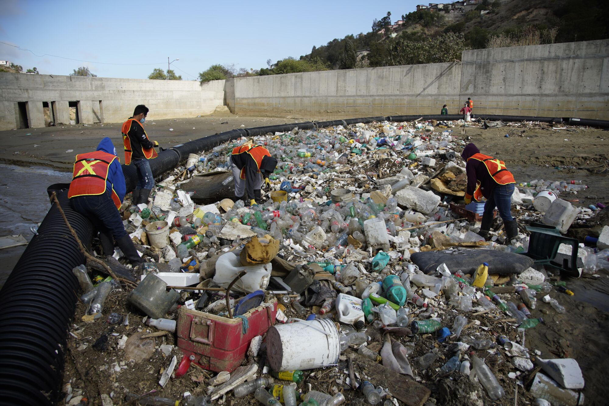 A trash boom in the Los Laureles Canyon in Tijuana 
