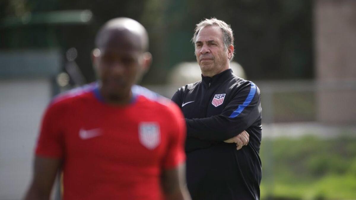 Bruce Arena, coach of the U.S. men's national soccer team, watches his squad during a practice session Jan. 11.