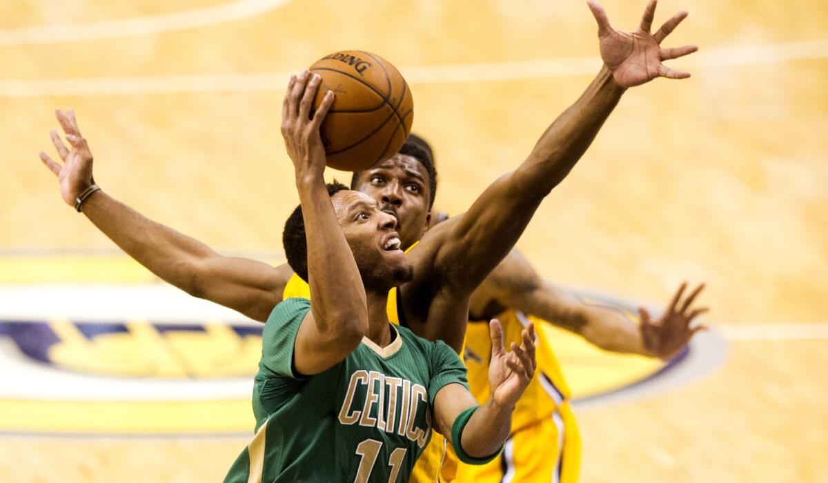 Celtics guard Evan Turner drives to the basket against the Pacers during Boston's 93-89 victory Saturday night.