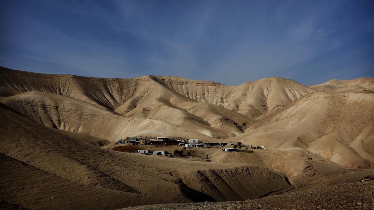 The Abu Dahouk family is among about 7,000 Bedouins who live on the slopes east of Jerusalem. About 30 encampments, each one measuring just a few acres, sit on rocky slopes nearly empty of trees and vegetation.