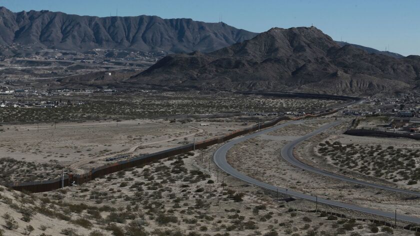 The Mexico-U.S. border fence, as seen from the Mexican side, separating the towns of Anapra, Mexico, and Sunland Park, New Mexico, on Jan. 25.