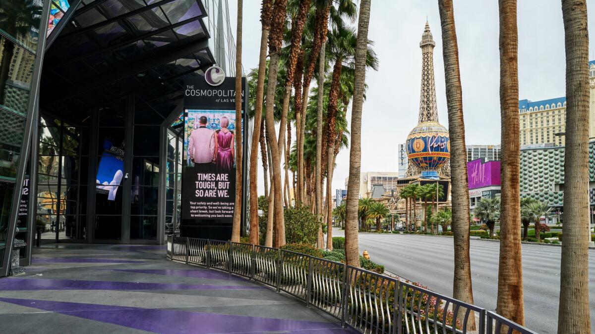 "Times are tough" sign stands outside the shuttered Cosmopolitan Las Vegas.
