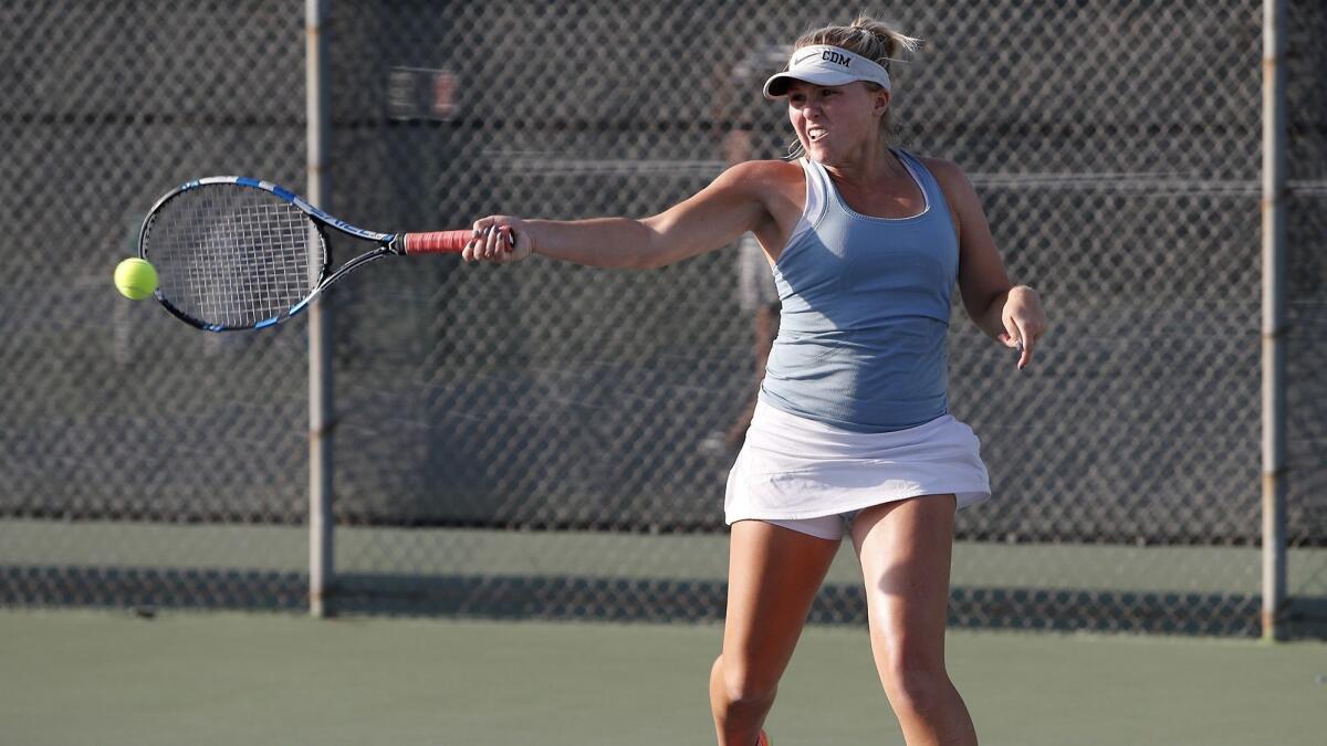 Corona del Mar High No. 2 doubles player Shaya Northrup strikes the ball at University in the semifinals of the CIF Southern Section Open Division playoffs on Wednesday.