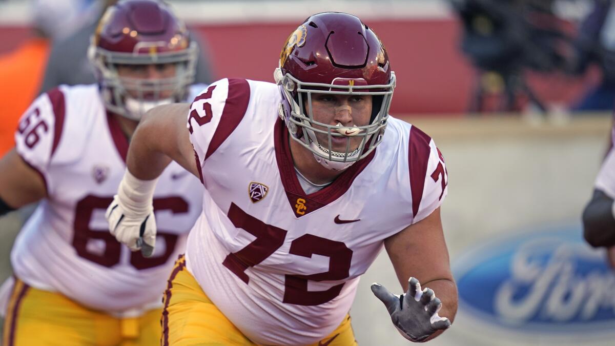 USC offensive lineman Andrew Vorhees warms up before a game.