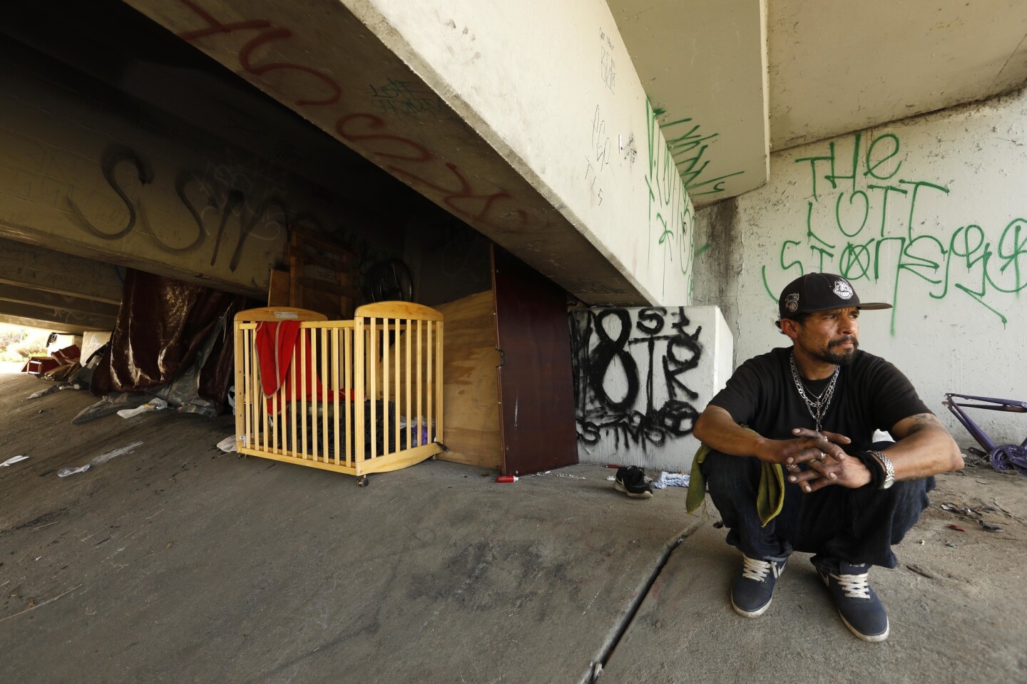 Manuel Pajar, 40 sits near his camp under an overpass during the 2019 Greater Los Angeles Homeless Count in the City of Commerce on Thursday. Pajar has been homeless for the past 9 years.