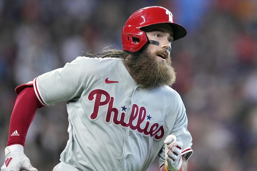 Philadelphia Phillies' Brandon Marsh runs up the first base line against the Houston Astros.