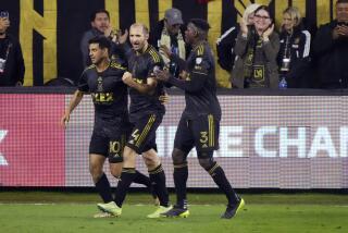 Los Angeles FC's Carlos Vela (10) celebrates his goal against Alajuelense with Giorgio Chiellini (14) and Jesús Murillo (3) during the second half of a CONCACAF Champions League soccer match Wednesday, March 15, 2023, in Los Angeles. (AP Photo/Marcio Jose Sanchez)