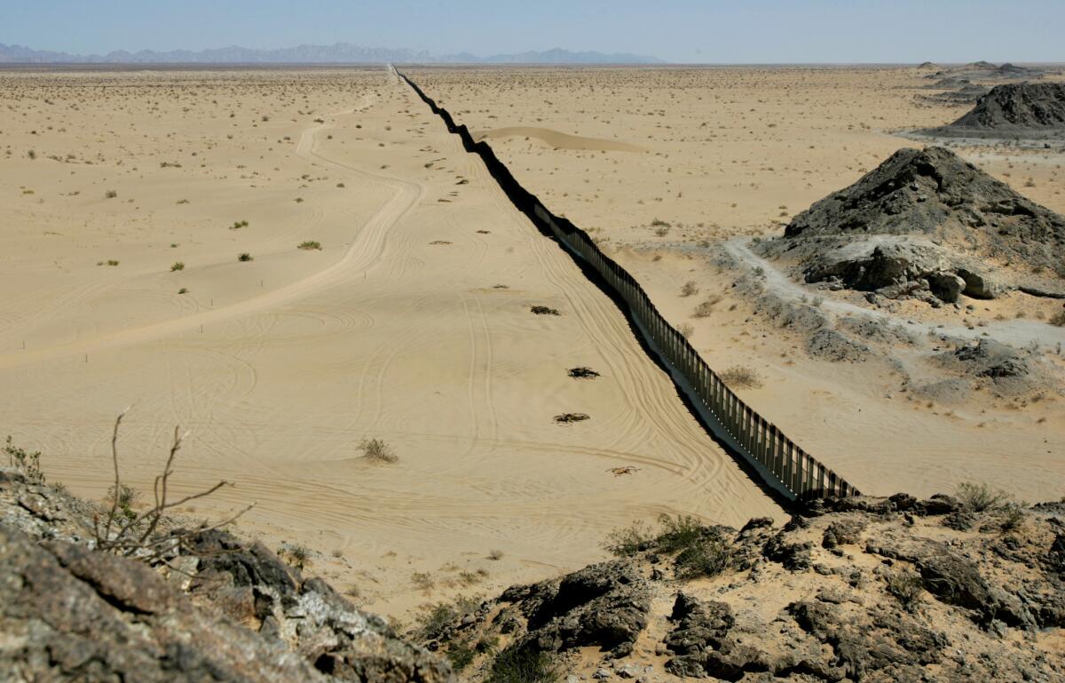 A new Tucson-based organization, the Colibri Center for Human Rights, aims to help officials identify the remains of migrants who die crossing into the U.S. from Mexico. This stretch of border fence separates Mexico and Arizona.