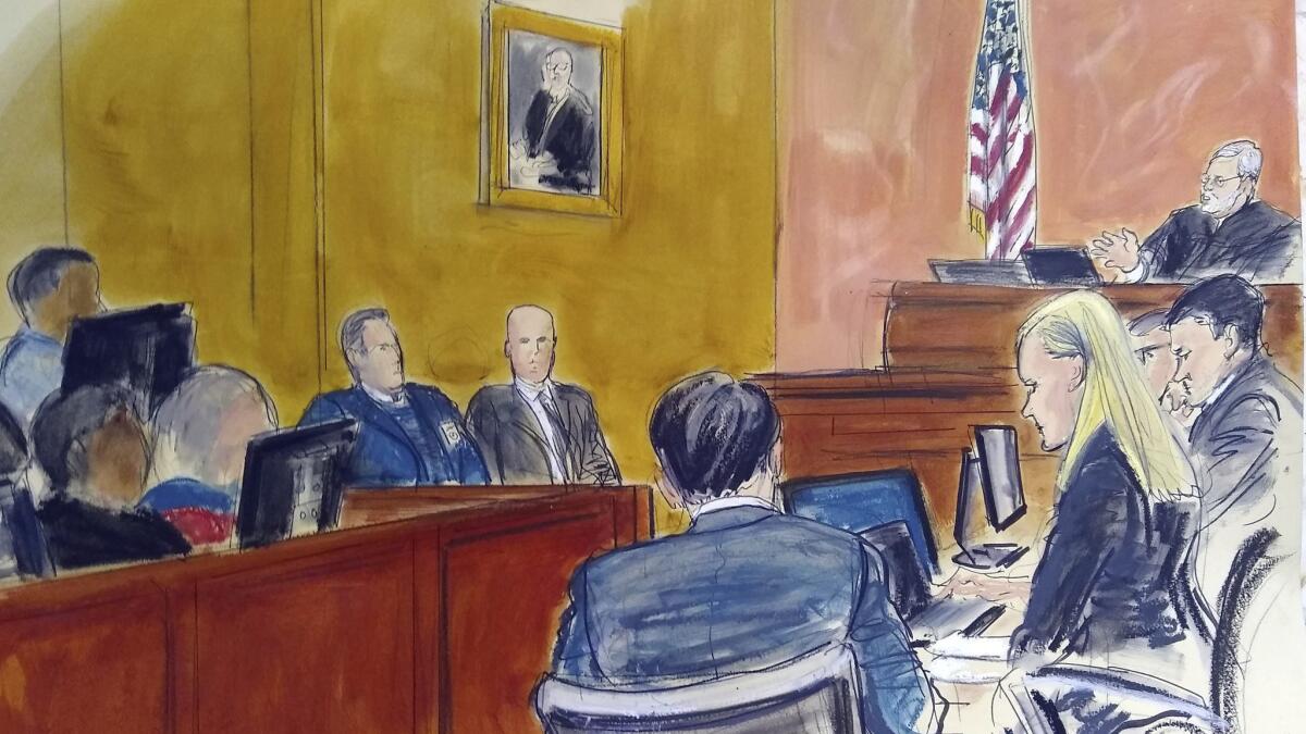 In this courtroom sketch, Judge Brian Cogan, upper right, instructs the jury in the federal trial of Mexican drug lord Joaquin "El Chapo" Guzman in New York on Feb. 4.
