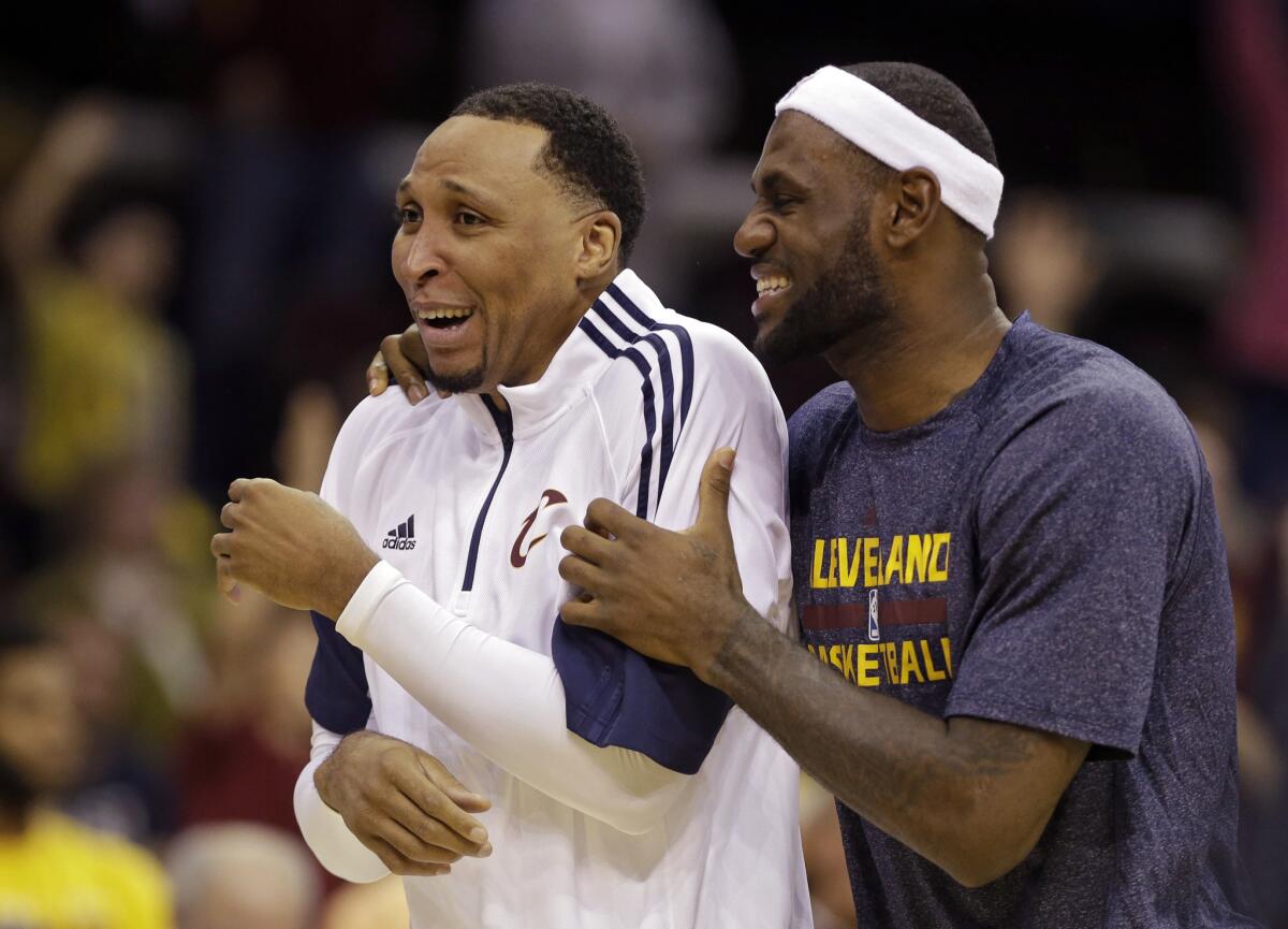 Cleveland Cavaliers' LeBron James with Shawn Marion in a preseason exhibition basketball game.