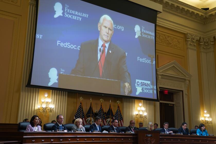 WASHINGTON, DC - JUNE 16: A video of then-Vice President Mike Pence plays during a House Select Committee to Investigate the January 6th hearing in the Cannon House Office Building on Thursday, June 16, 2022 in Washington, DC. The bipartisan Select Committee to Investigate the January 6th Attack On the United States Capitol has spent nearly a year conducting more than 1,000 interviews, reviewed more than 140,000 documents day of the attack. (Kent Nishimura / Los Angeles Times)
