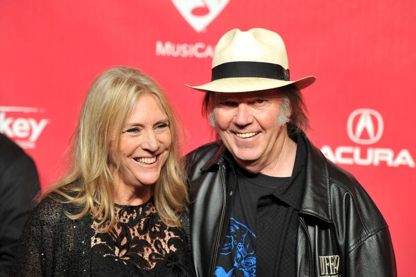 Pegi Young and Neil Young, shown in 2012, are divorcing after nearly 37 years of marriage.